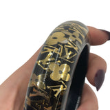 Louis Vuitton Wide Inclusion Resin & Stars Bangle in black